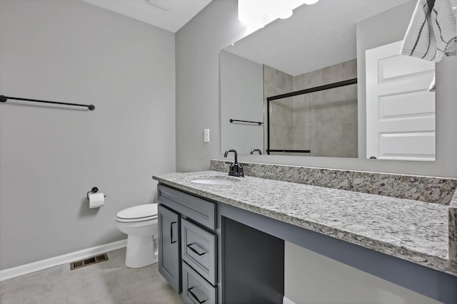 121 E Wind Rd, Delaware, OH 43015 - full bathroom featuring toilet, vanity, visible vents, a stall shower, and baseboards