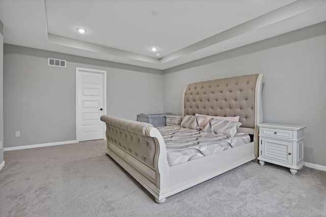 121 E Wind Rd, Delaware, OH 43015 - bedroom with a tray ceiling, visible vents, baseboards, and carpet floors