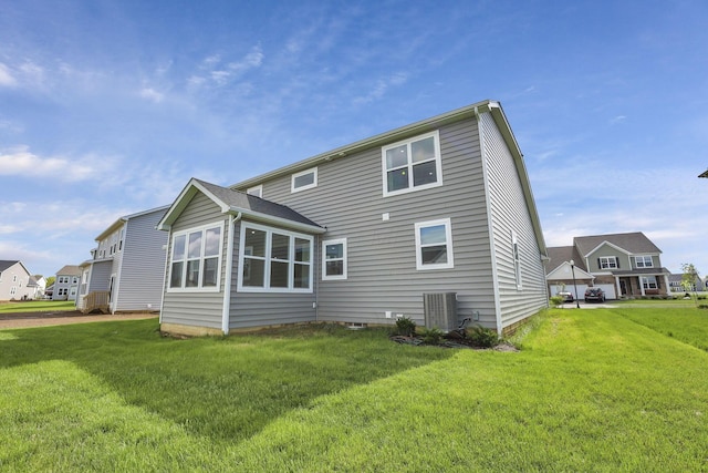 121 E Wind Rd, Delaware, OH 43015 - rear view of property with a yard