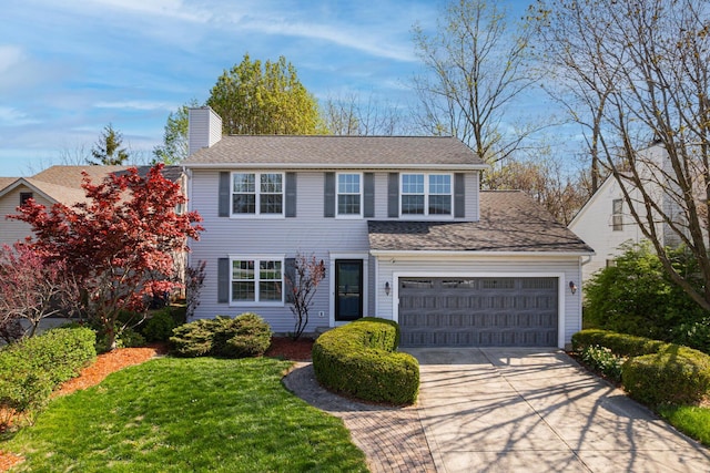 1418 Brookforest Dr, Columbus, OH 43204 - traditional home featuring a chimney, a shingled roof, a garage, driveway, and a front lawn