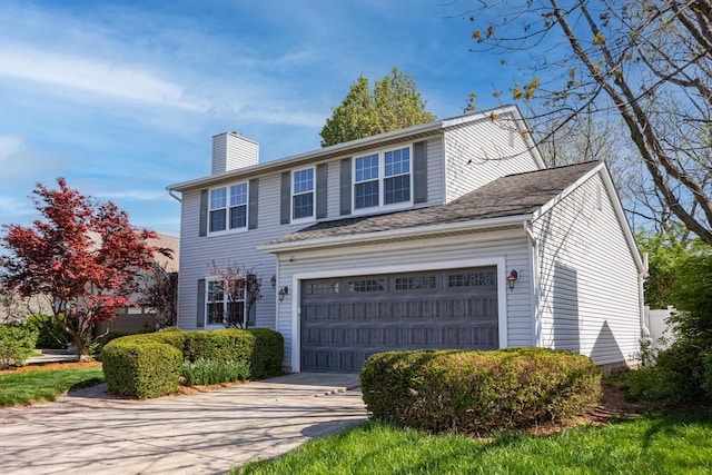 1418 Brookforest Dr, Columbus, OH 43204 - traditional home featuring a chimney, concrete driveway, and an attached garage