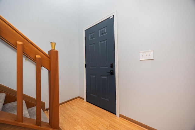 1418 Brookforest Dr, Columbus, OH 43204 - entryway featuring baseboards, stairway, and light wood-type flooring