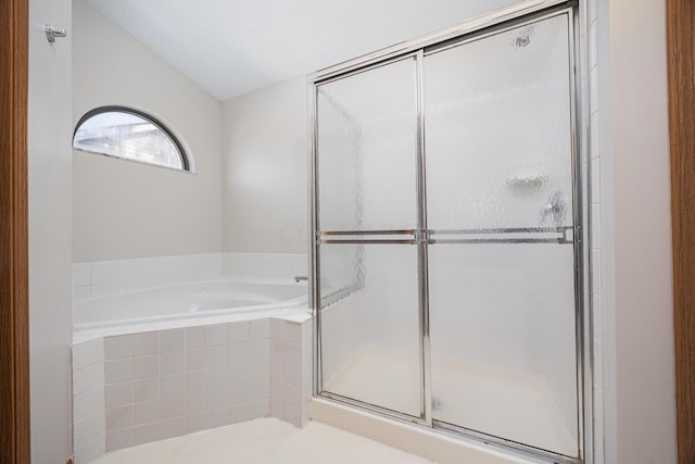 1418 Brookforest Dr, Columbus, OH 43204 - full bathroom with lofted ceiling, a garden tub, and a stall shower