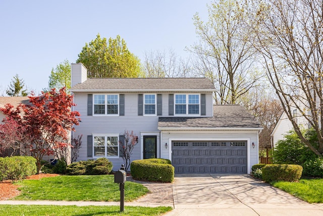 1418 Brookforest Dr, Columbus, OH 43204 - view of front of house featuring concrete driveway, a front lawn, and a chimney