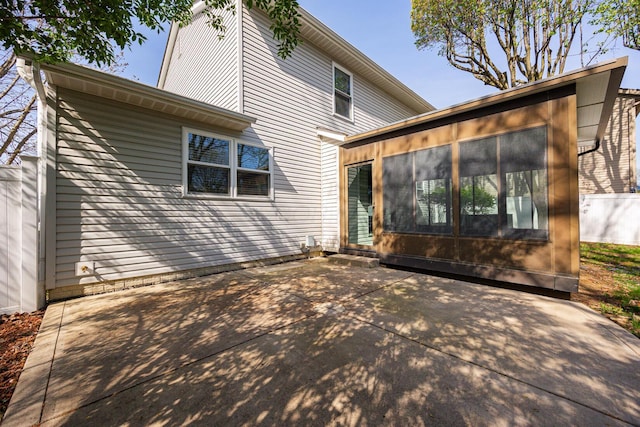 1418 Brookforest Dr, Columbus, OH 43204 - rear view of property featuring a sunroom and a patio area