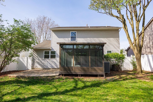 1418 Brookforest Dr, Columbus, OH 43204 - back of property with a yard, a sunroom, a patio, and fence