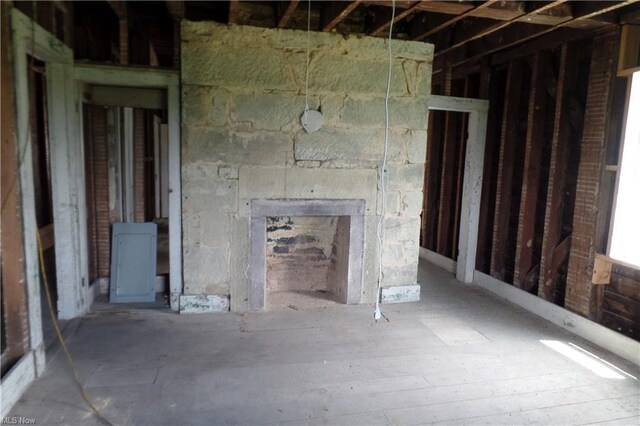 unfurnished living room with a fireplace