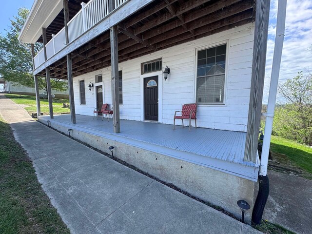 entrance to property with a porch