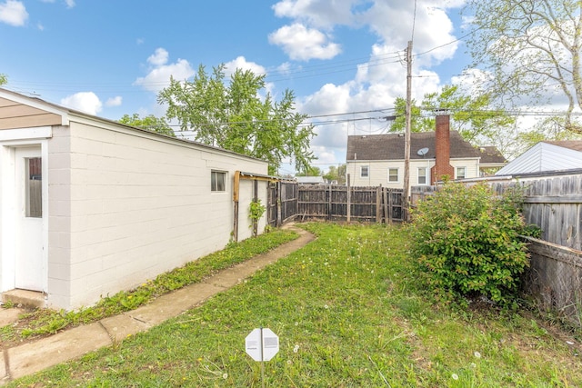 view of yard with a fenced backyard