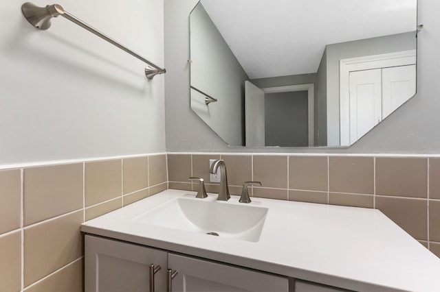 bathroom with vanity and backsplash