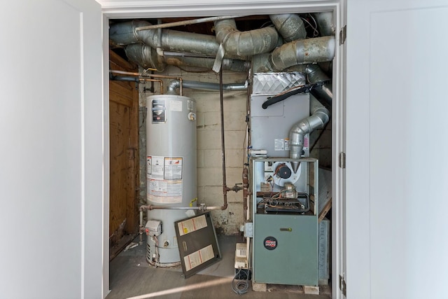 utility room with heating unit and water heater