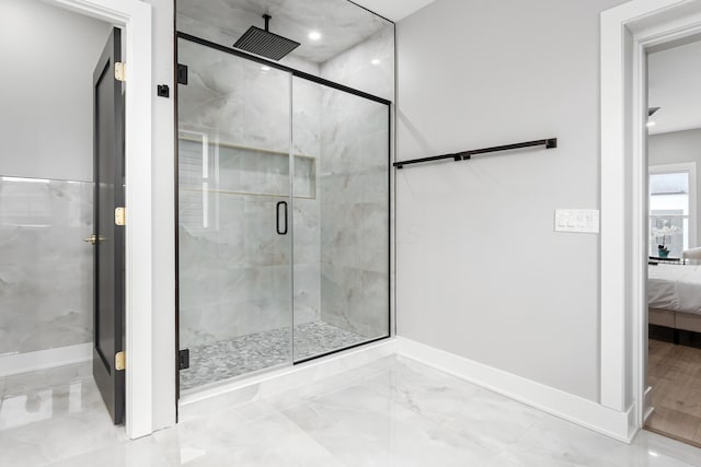 ensuite bathroom featuring ensuite bath, a stall shower, baseboards, marble finish floor, and recessed lighting