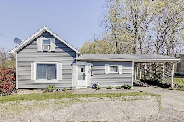 12500 E St, Howard, OH 43028 - view of front of house with driveway and cooling unit