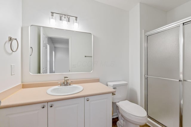 6516 Nottinghill Trail Dr, Canal Winchester, OH 43110 - bathroom featuring a shower stall, toilet, and vanity