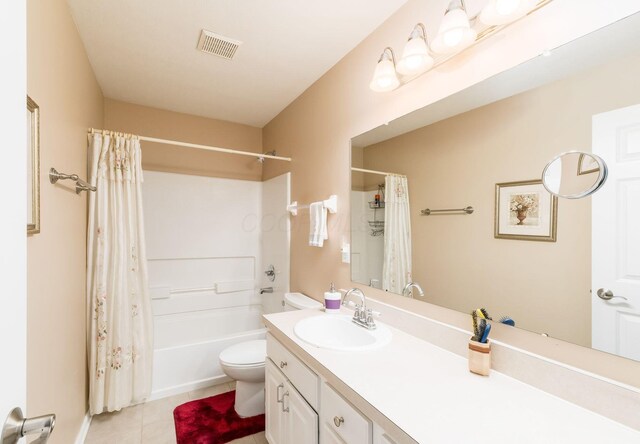 bathroom featuring tile patterned floors, visible vents, toilet, vanity, and shower / tub combo with curtain