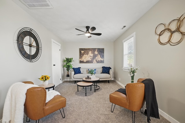 1425 Mount Vernon Ave, Columbus, OH 43203 - living area featuring carpet floors, a ceiling fan, visible vents, and baseboards