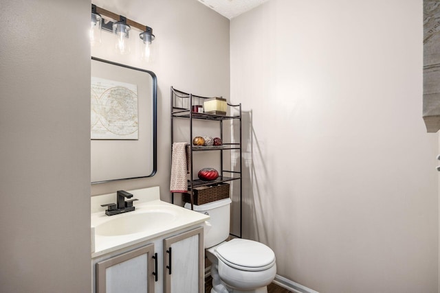 half bath with toilet and vanity