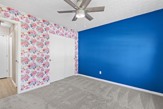 9222 Windy Creek Dr, Columbus, OH 43240 - unfurnished room featuring carpet floors, a textured ceiling, and ceiling fan