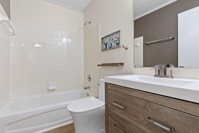 9222 Windy Creek Dr, Columbus, OH 43240 - full bathroom with a textured ceiling, shower / bathing tub combination, vanity, toilet, and ornamental molding