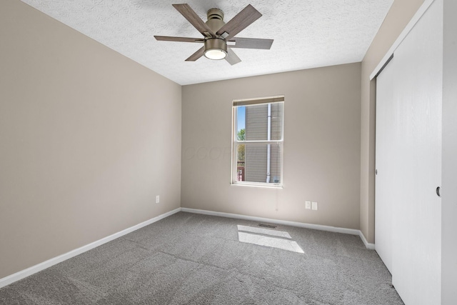 9222 Windy Creek Dr, Columbus, OH 43240 - unfurnished bedroom with baseboards, a textured ceiling, and carpet