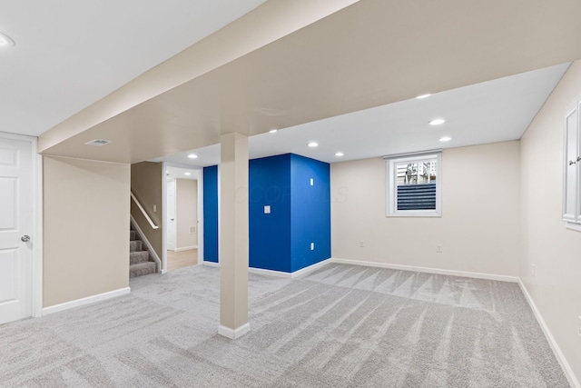 9222 Windy Creek Dr, Columbus, OH 43240 - basement featuring carpet floors, stairs, and baseboards