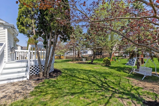 9222 Windy Creek Dr, Columbus, OH 43240 - view of yard with fence and a deck