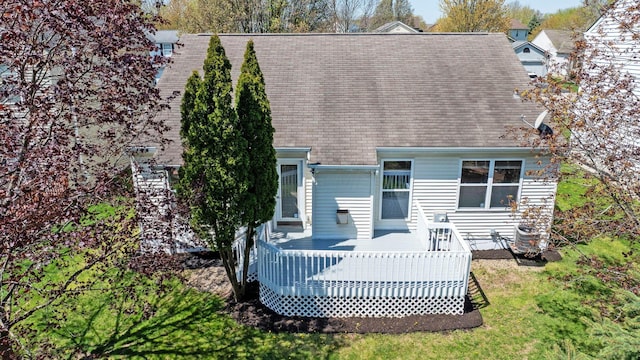 9222 Windy Creek Dr, Columbus, OH 43240 - rear view of house with a wooden deck, cooling unit, and roof with shingles