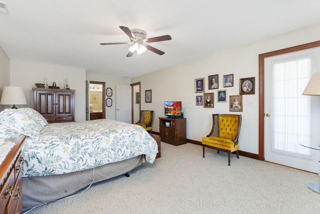 4690 Arrowhead Dr NW, Carroll, OH 43112 - bedroom featuring light carpet, baseboards, ceiling fan, and ensuite bath