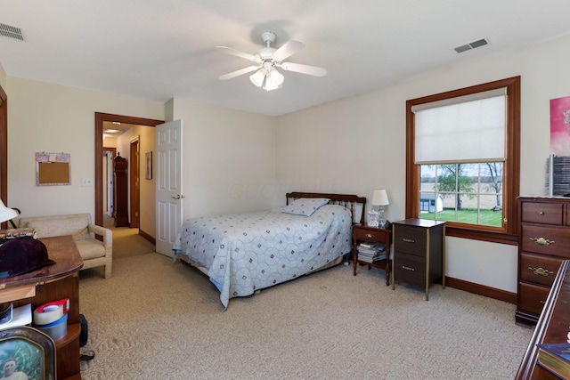 4690 Arrowhead Dr NW, Carroll, OH 43112 - bedroom featuring light colored carpet, baseboards, and ceiling fan