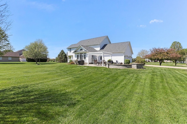 4690 Arrowhead Dr NW, Carroll, OH 43112 - rear view of house featuring a pergola, a patio, and a lawn