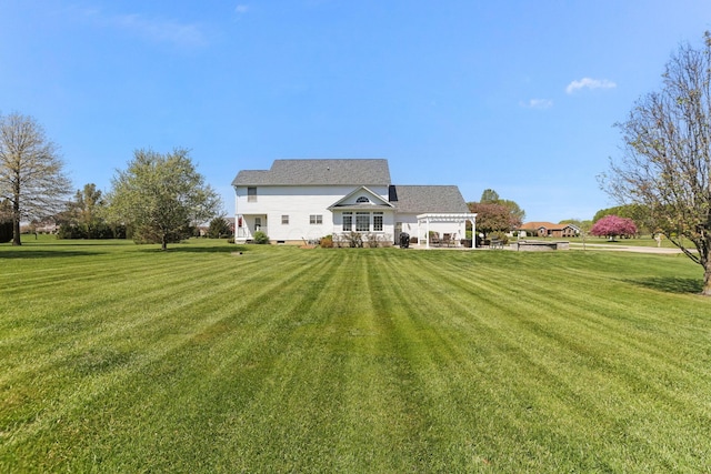 4690 Arrowhead Dr NW, Carroll, OH 43112 - rear view of house featuring a yard