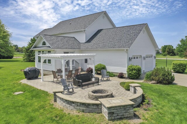 4690 Arrowhead Dr NW, Carroll, OH 43112 - back of property featuring a pergola, a fire pit, a lawn, a patio, and a shingled roof