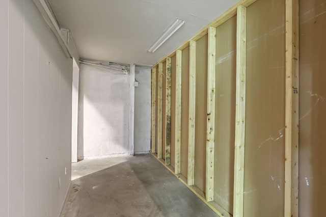hallway featuring concrete flooring