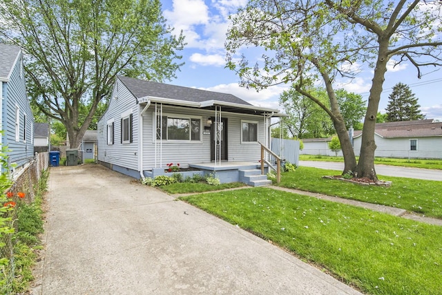 2728 Hiawatha St, Columbus, OH 43211 - bungalow-style house featuring concrete driveway and a shingled roof