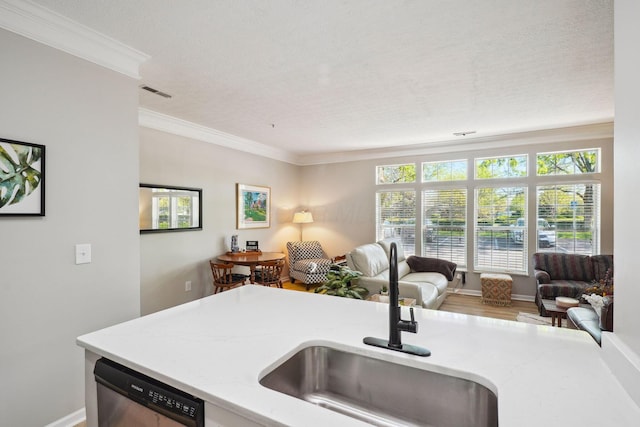kitchen with stainless steel dishwasher, crown molding, visible vents, open floor plan, and a sink