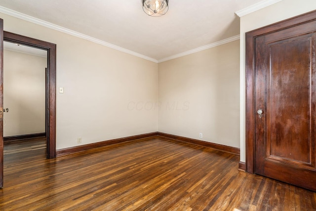 629 Hilltonia Ave, Columbus, OH 43223 - unfurnished room with ornamental molding, baseboards, and dark wood-style flooring