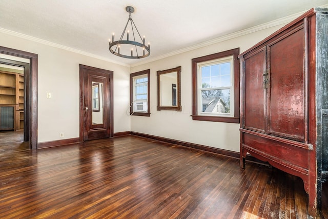 629 Hilltonia Ave, Columbus, OH 43223 - entryway with an inviting chandelier, ornamental molding, wood finished floors, and baseboards
