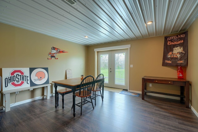dining area with dark wood-style floors, recessed lighting, wooden ceiling, baseboards, and french doors
