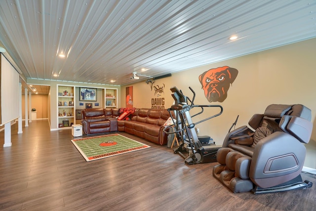 living area with built in shelves, recessed lighting, wood finished floors, and wood ceiling