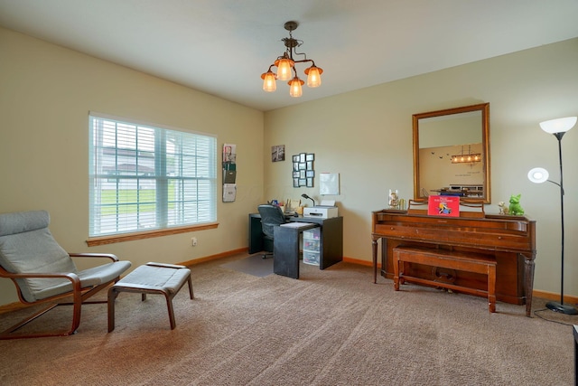 living area featuring an inviting chandelier, carpet floors, and baseboards
