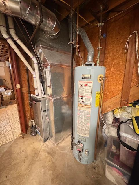 utility room featuring gas water heater