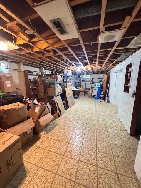 below grade area featuring tile patterned floors