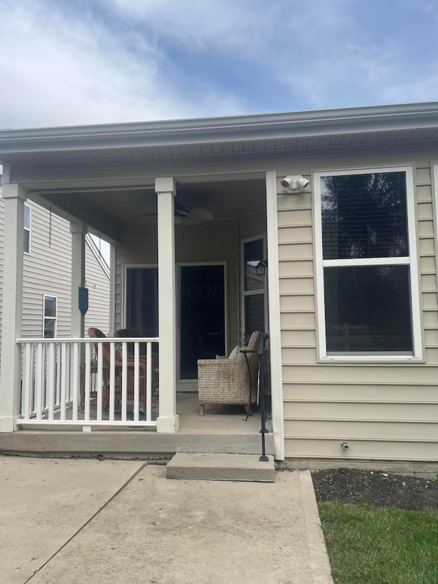 doorway to property with covered porch