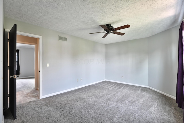 38 Ravine Ridge Dr S, Powell, OH 43065 - unfurnished room featuring ceiling fan, baseboards, carpet flooring, and visible vents