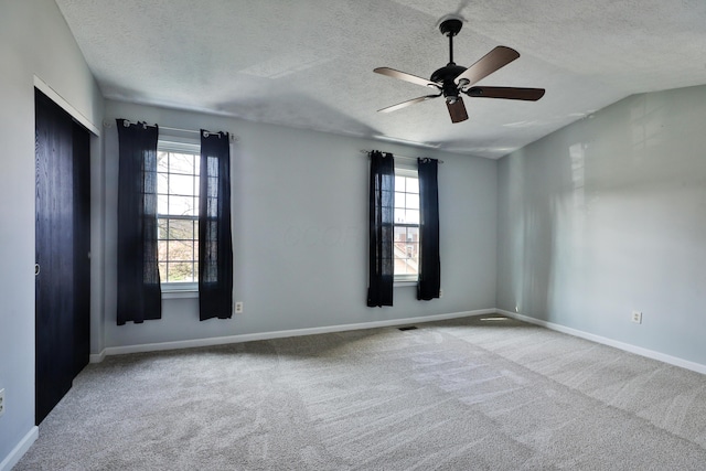 38 Ravine Ridge Dr S, Powell, OH 43065 - unfurnished room with ceiling fan, baseboards, carpet flooring, and a textured ceiling