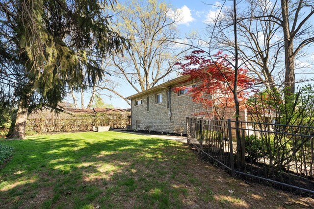 view of yard with fence