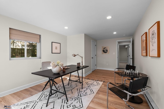 home office featuring recessed lighting, light wood finished floors, and baseboards