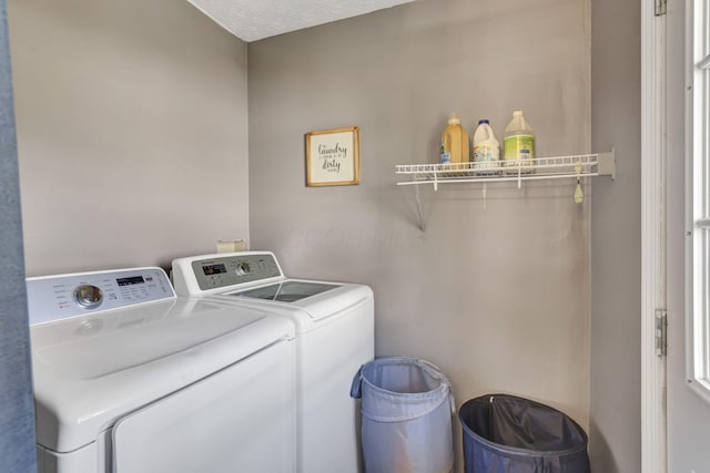clothes washing area with laundry area and independent washer and dryer