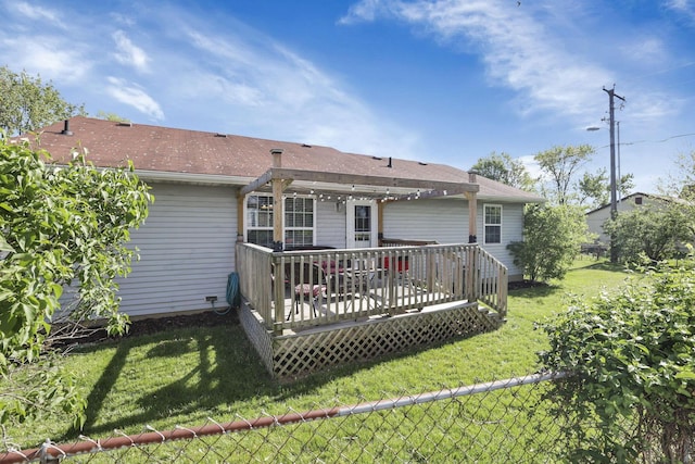 back of property with a yard, a pergola, fence, and a wooden deck
