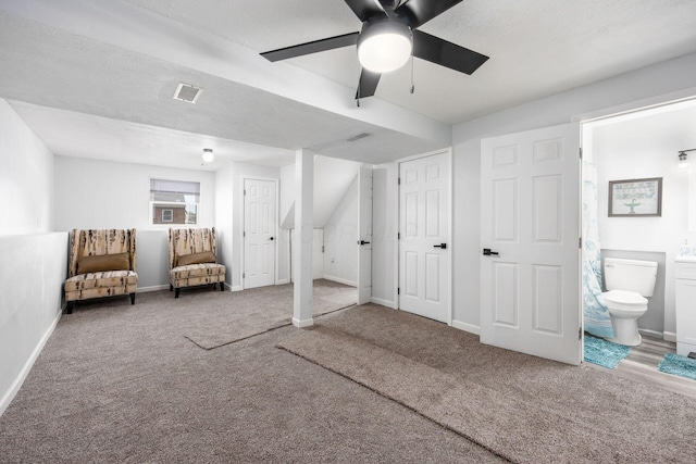 5930 Parkglen Rd, Galloway, OH 43119 - living area with baseboards, visible vents, carpet floors, and ceiling fan